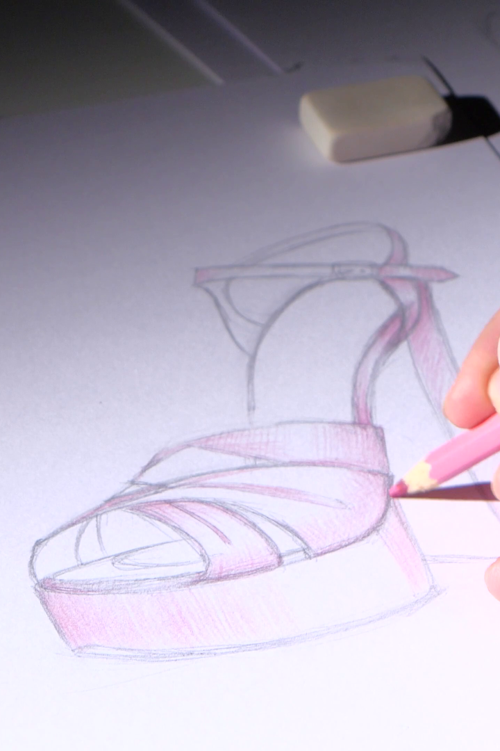 Women drawing a shoe